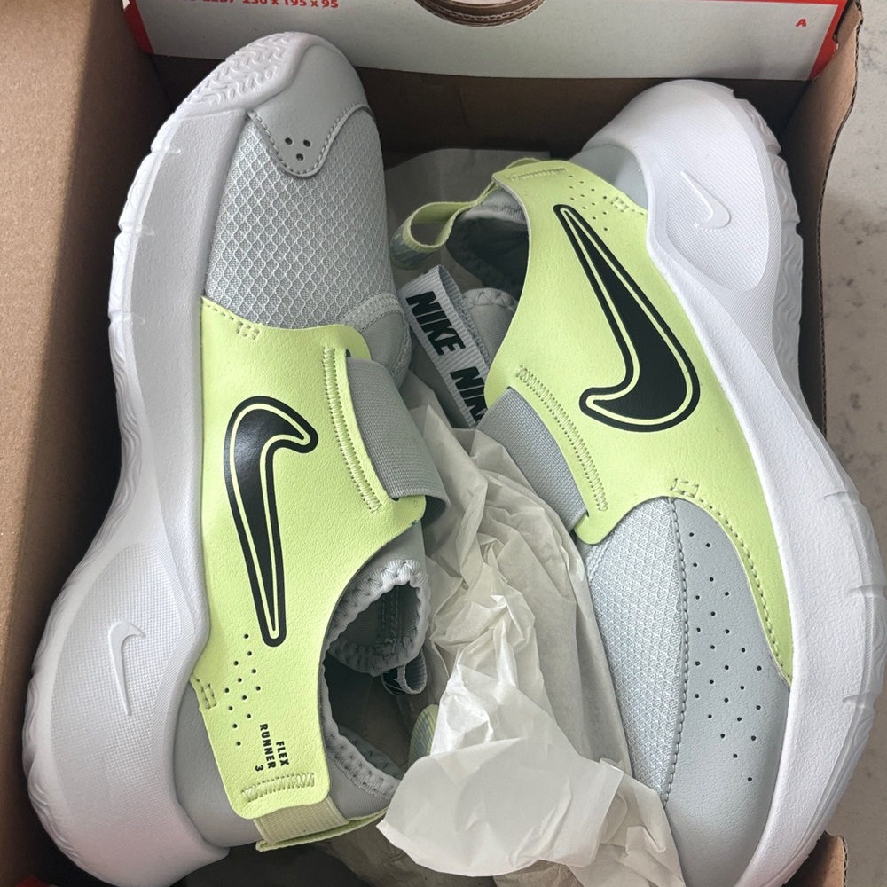 Nike Slip-On Sneakers in Light Green and White with Black Swoosh